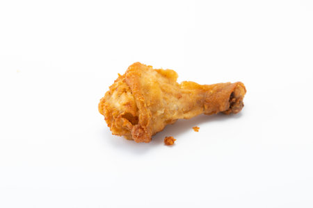 Fried chicken thigh isolated on white background.の写真素材