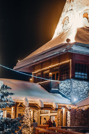 Santa Claus' office in his village in Rovaniemi, Lapland at night, snowyの写真素材