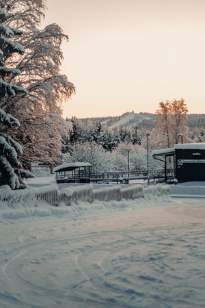 View through snowy neigbourhood to ski resort in Rovaniemi, Laplandの写真素材
