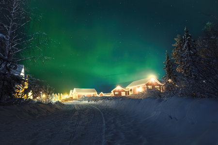 Aurora in starry sky above Santa Claus' Village in Rovaniemi, Laplandの写真素材
