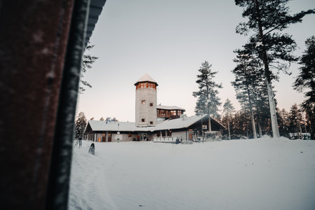 Entrance building in forest to wildlife park in winter in Ranua, Laplandの写真素材