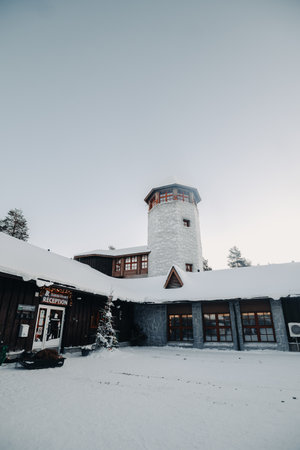 Snowy tower at entrance to wildlife park in Ranua, Laplandの写真素材
