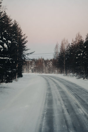 Icy road through the arctic in Ranua, Laplandの写真素材