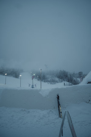 Misty Ounasvaara ski resort in winter twilight in Rovaniemi, Laplandの写真素材
