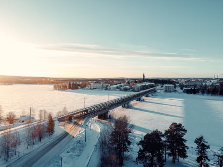 Aerial view of railway bridge over Ounasjoki river in Rovaniemi, Laplandの写真素材