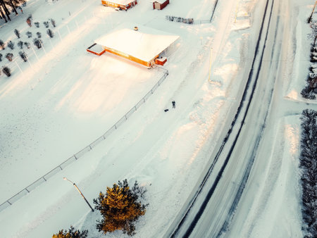 Aerial view of snowy road in winter in Rovaniemi, Laplandの写真素材