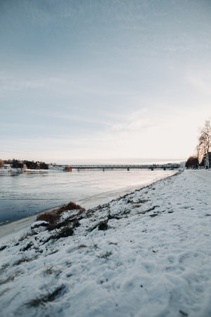 Ounasjoki river with a bit of snow in autumn in Rovaniemi, Laplandの写真素材