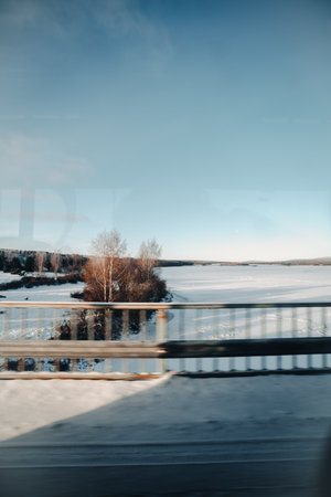 Lapland wilderness view from bus window in Rovaniemiの写真素材