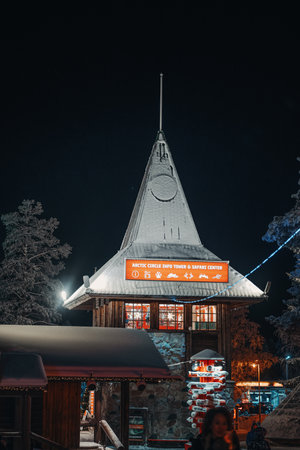 Info Tower in Santa Claus Village in Rovaniemi, Lapland at nightの写真素材