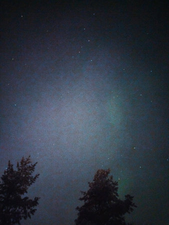 Very faint aurora in night sky in Rovaniemi, Laplandの写真素材
