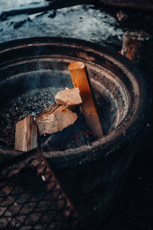 Firewood in fireplace in Ounasvaara laavu in Rovaniemi, Laplandの写真素材