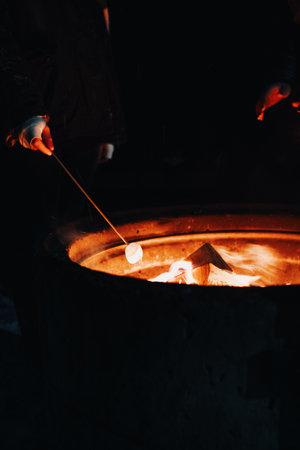Masrhmallow next to fire in Rovaniemi, Laplandの写真素材