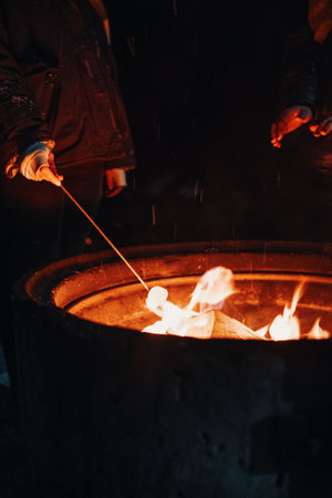 Marshmallow cooking next to fire in Rovaniemi, Laplandの写真素材