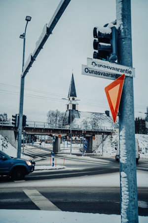Rovaniemi church behind traffic lights in winter in Rovaniemi, Laplandの写真素材