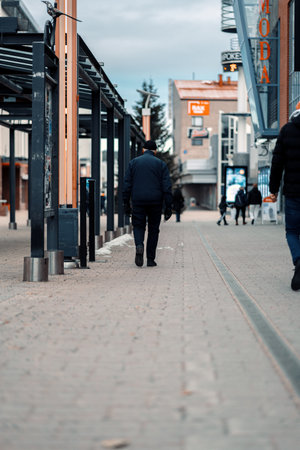 Man walking towards Sampokeskus in Rovaniemi, Laplandの写真素材