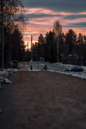 Road through Syvasenvaara in autumn at sunsetの写真素材