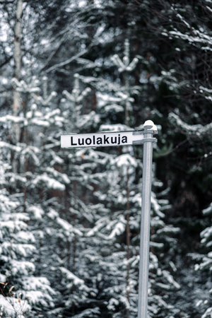 Luolakuja snowy street sign in Rovaniemi, Laplandの写真素材