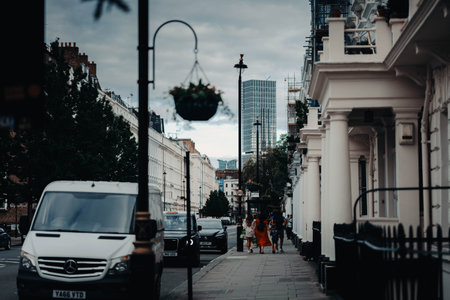 Apartment block at the end of residential street in central London, UKの写真素材