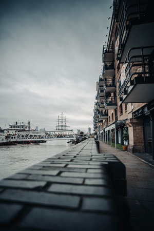 Footpath in Shad Thames next to River Thames in London, UKの写真素材