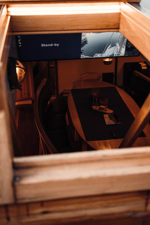 Lower deck of old wooden fishing boat in Tromso, Norway on arctic fjordの写真素材