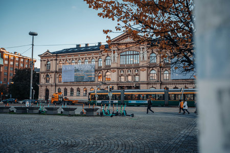 Tram going past art museum in central Helsinki, Finland in autumnの写真素材