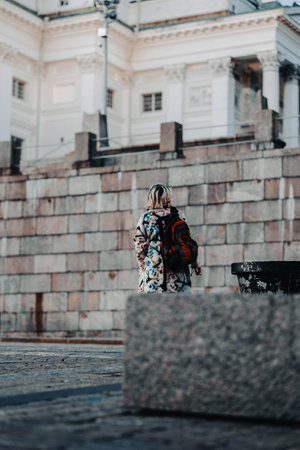 Woman looking up at Cathedral of Helsinki, Finlandの写真素材