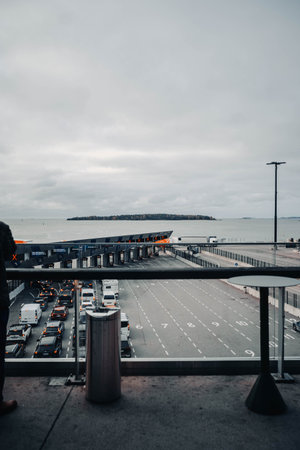 Cars queuing to board ferry at the Port of Helsinki in autumn in Finlandの写真素材