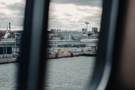 Tallinn Port on cloudy day in autumn, shot from ferry windowの写真素材
