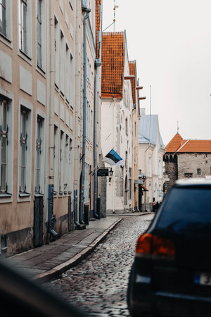 Estonia flag on building on street in the old town in Tallinn, Estoniaの写真素材