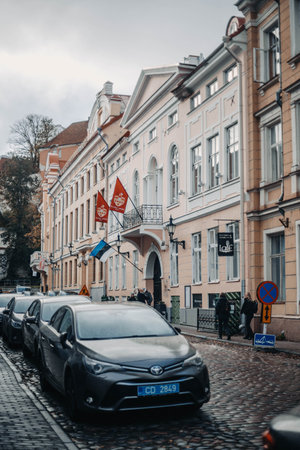 Fancy hotel with Estonian flag in the old town in Tallinn, Estoniaの写真素材