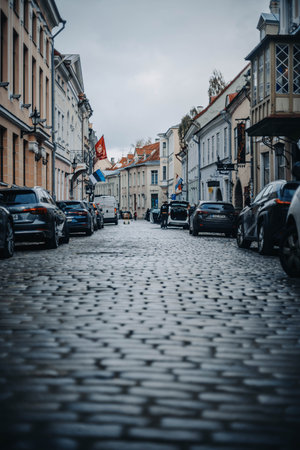 Cobbled street in the old town in Tallinn, Estonia, damp with rain waterの写真素材
