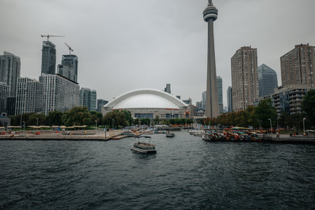 View of boats outside a stadium in Toronto from Lake Ontarioの写真素材