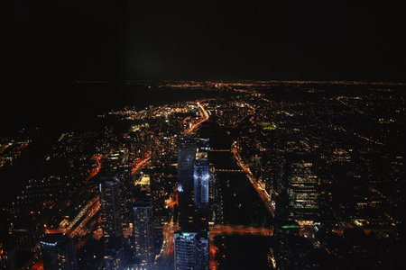 Landscape shot of the city of Toronto, Ontario at night, aerialの写真素材