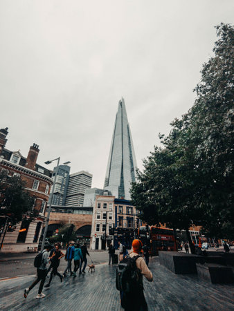 View of the Shard from the streets of London on cloudy day in the UKの写真素材