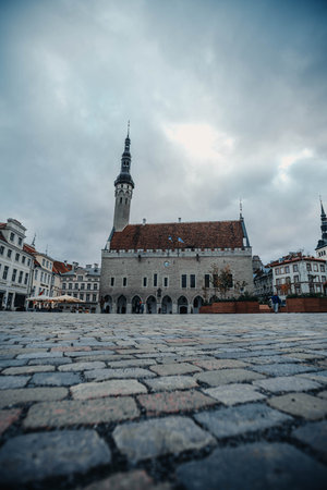City hall and old town square on cloudy day in Tallinn, Estoniaの写真素材