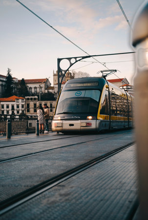 Porto metro on the Dom Luis I bridge at sunset in Portugalの写真素材