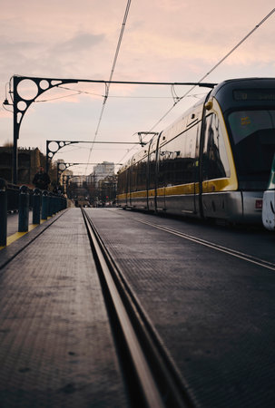 Sunset sky over tram on Dom Luis I bridge, Portugalの写真素材