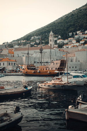 Old wooden ship in Dubrovnik old town harbour, Croatiaの写真素材