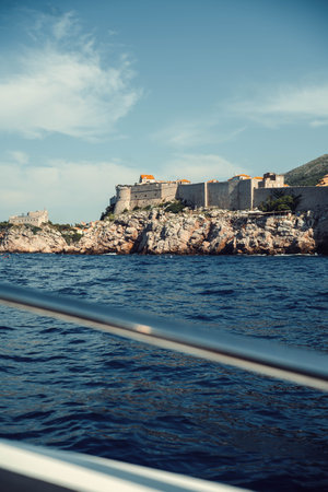 Dubrovnik, Croatia old town city wall in summer, shot from boat on the seaの写真素材