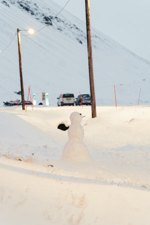 Snowman next to road outside hostel entrance in Longyearbyen, Svalbardの写真素材