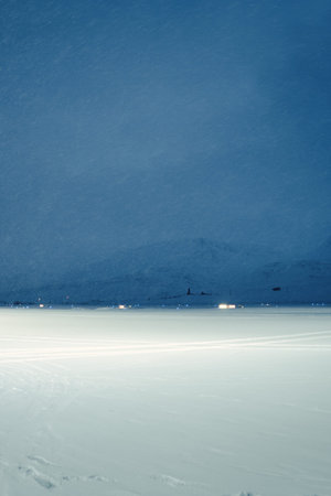 Snowy runway at Longyearbyen airport at night in Svalbard