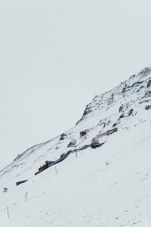 Abandoned coal mine in the arctic on snowy mountainside, Longyearbyen, Svalbardの写真素材
