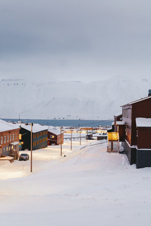 View of Longyearbyen town in Svalbard by fjord from Nybyen hostel in the arcticの写真素材