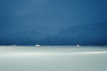 Snowy runway at Longyearbyen airport at twilight in Svalbard winterの写真素材