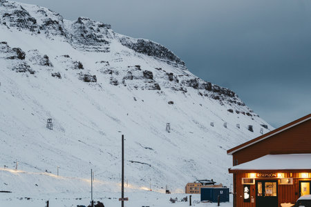 Aerial cableway along the side of snowy mountain in Longyearbyen, Svalbardの写真素材