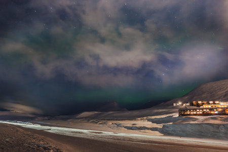 Aurora borealis above the northernmost town in the world, Longyearbyen, Svalbardの写真素材