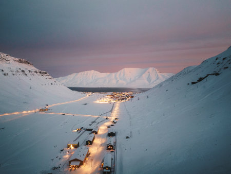 Aerial shot of Longyearbyen, Svalbard at sunset in the arctic winterの写真素材