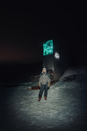 Man stood in front of the Global Seed Vault in Longyearbyen, Svalbardの写真素材