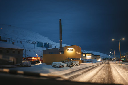 Coal factory in the arctic in snowy winter in Longyearbyen, Svalbard polar night