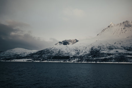 Snowy mountains skyline view in the Lyngen Alps in northern Norwayの写真素材
